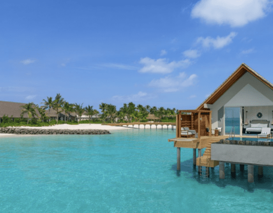 a house on stilts over water